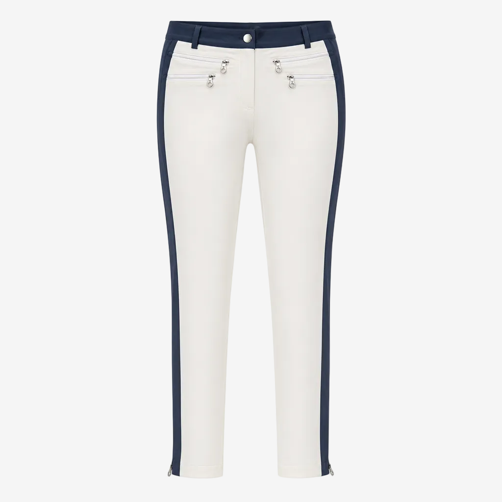 White cropped pants with navy blue side panels and silver-tone hardware details on the front pockets, shown against a plain white background.