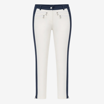 White cropped pants with navy blue side panels and silver-tone hardware details on the front pockets, shown against a plain white background.