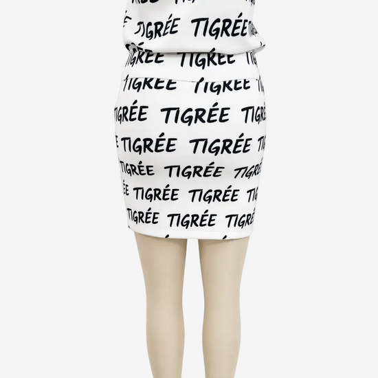 White skirt with black text pattern on a white background