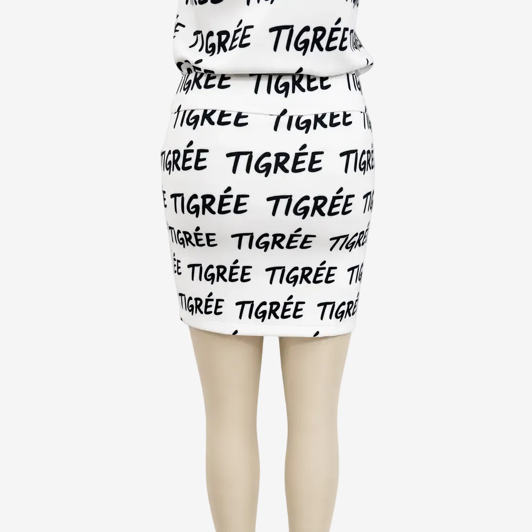 White skirt with black text pattern on a white background