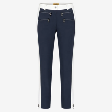 A pair of navy blue cropped pants with white side panels, featuring silver zipper details on the front and along the lower hems, shown against a plain white background.