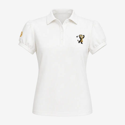 A white short-sleeve polo shirt with a collar and button placket, featuring a small embroidered tiger mascot on the left chest and a gold emblem on the right sleeve, shown against a plain white background.