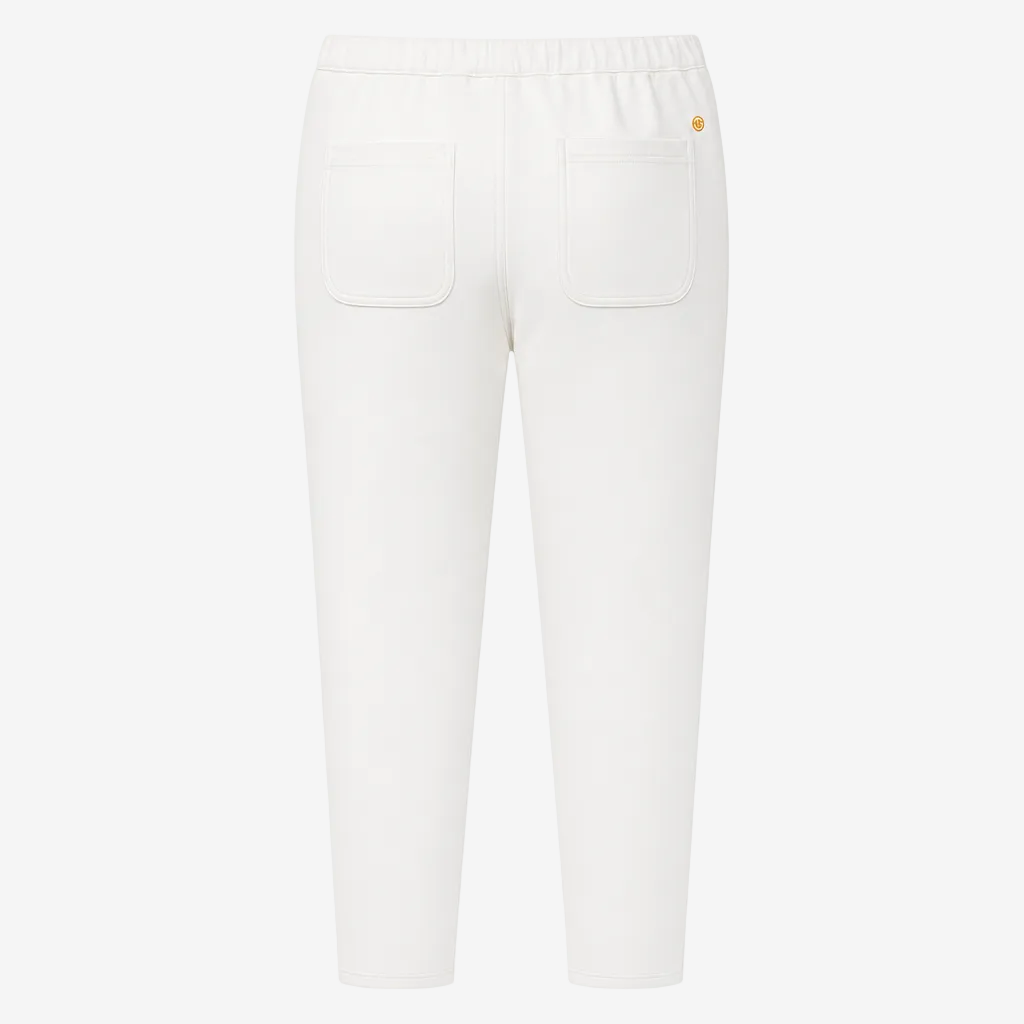 White cropped pants with an elastic waistband, two back patch pockets, and a small gold logo on the upper right hip, shown against a plain white background.