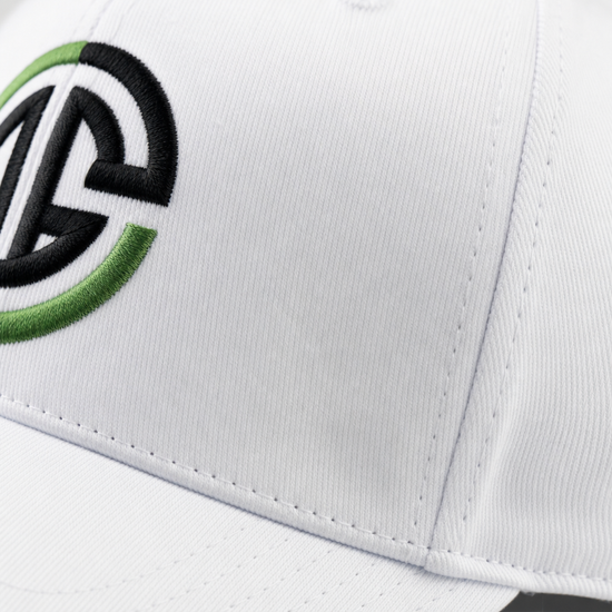 Close-up of a white cap with a logo featuring green and black design.