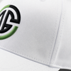 Close-up of a white cap with a logo featuring green and black design.