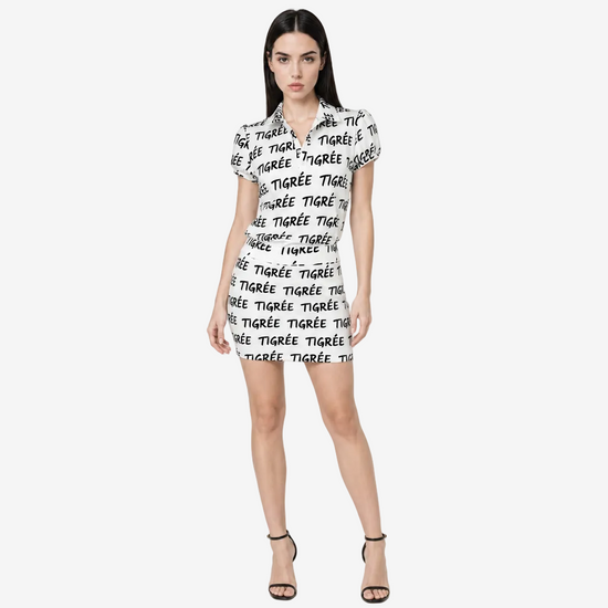 Woman wearing a white dress with black text on a plain background