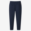 A pair of navy blue cropped pants with an elastic waistband, two large front patch pockets, and a small yellow embroidered logo on the upper right hip, shown against a plain white background.
