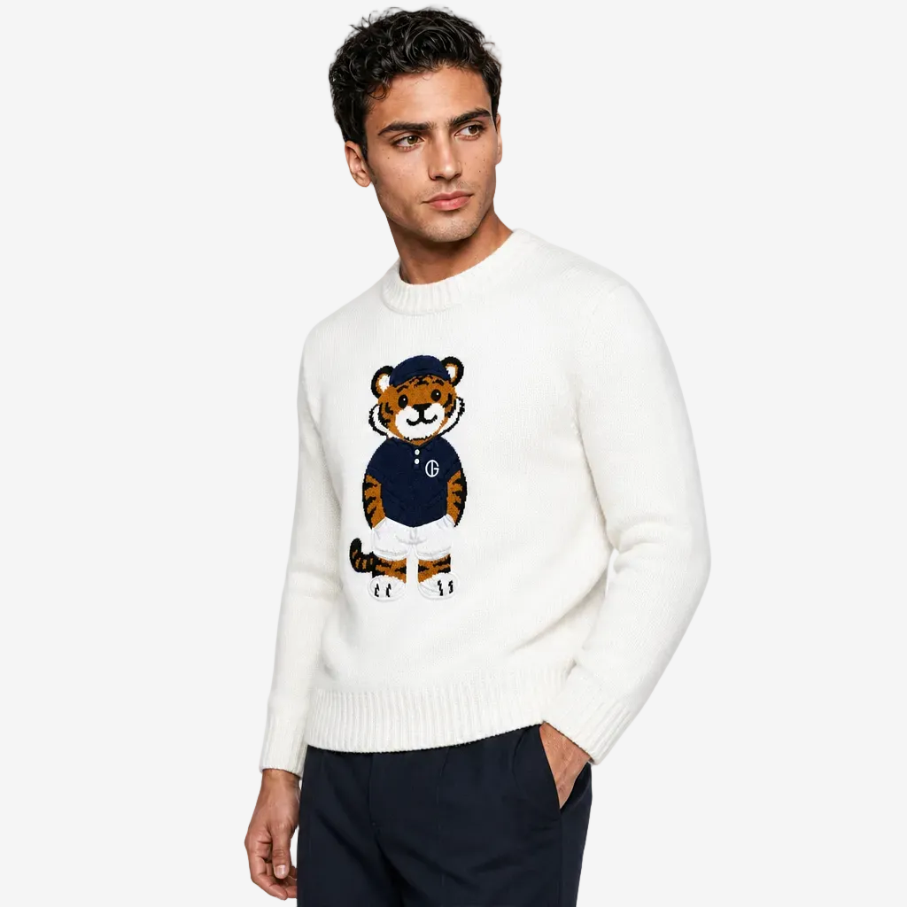 Man wearing a white sweater with a tiger design on a white background