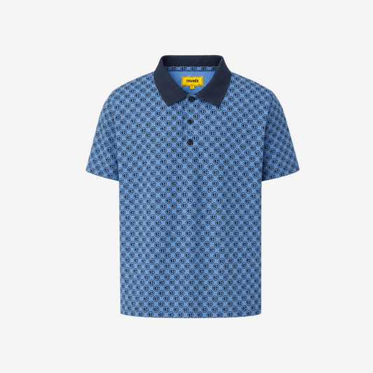 A short-sleeve polo shirt with a blue and white geometric pattern, featuring a solid navy blue collar and a three-button placket. The brand name 'POLO' is visible on the inner neck label.