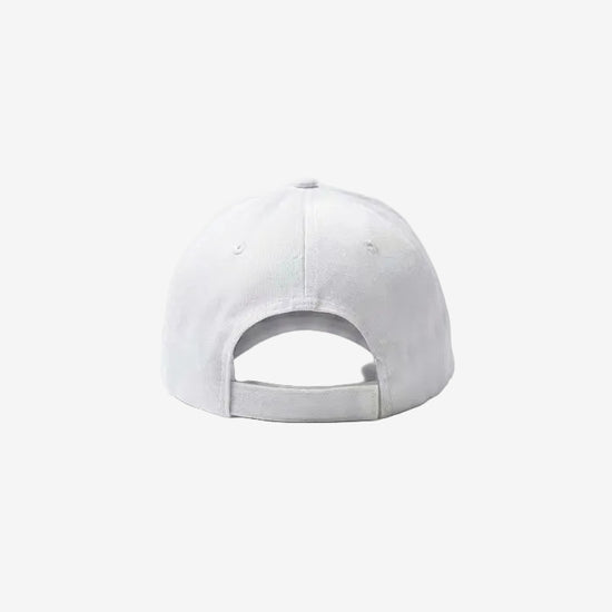 White baseball cap on a light gray background