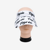 White visor with black text on a mannequin head against a white background