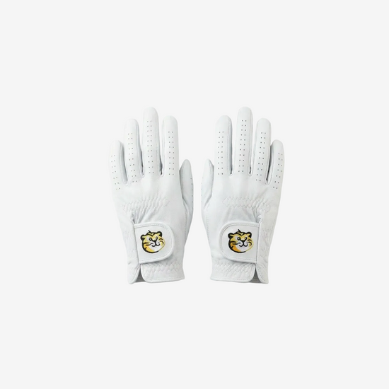 Pair of white golf gloves with logos on a light gray background