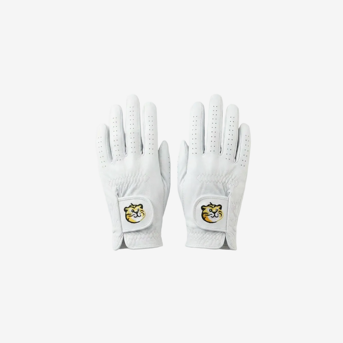 Pair of white golf gloves with logos on a light gray background